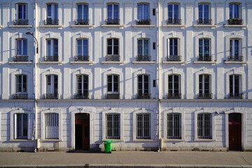 typical parisians building facade , haussmannian style  15th arrondissement