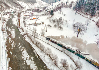 Mocanita Maramures Steam Train from Romania in a winter landscape