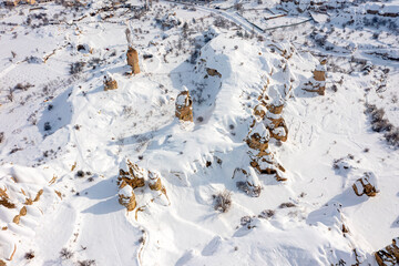 Pigeon Valley and Cave town in Göreme in winter, Fairy chimneys, Cappadocia, Turkey.