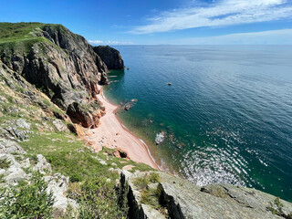 The beautiful Southeastern coast of the island of Shkota in August in sunny weather. Russia, Vladivostok city