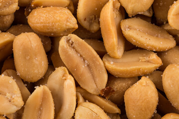 large amount of peeled salted peanuts
