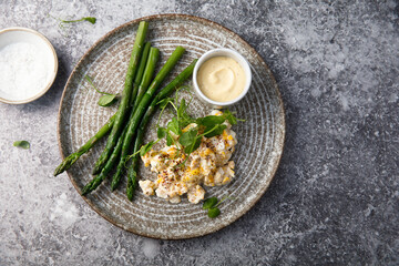 Asparagus with roasted eggs