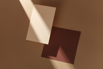 Set of colored floating blank card sheets with shadow on brown background. Minimalism business...