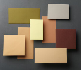 Fototapeta premium Group of floating colored blank cards sheet with shadow on dark gray background. Minimalism business brand template, creative layout