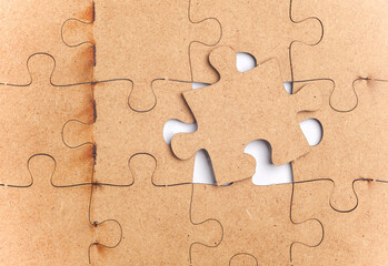 Wooden pieces jigsaw puzzle on white background