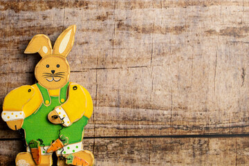 Easter Bunny on wooden background with copy space