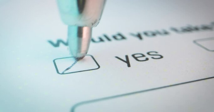 Pen hovers over the selection rectangle of YES or NO checkbox, unsure choice official document, close-up