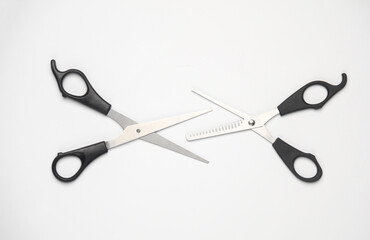 Hair cutting scissors on white background