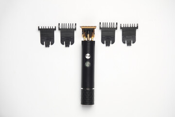 Beard trimmer with attachments on a white background