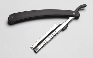 Straight razor on white background