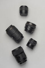Fototapeta na wymiar Professional Camera Lenses on a gray background. Top view