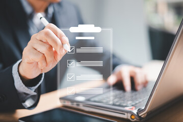 Businessman use computer laptop test online checklist survey, fill digital poll quiz assessment, education questionnaire evaluation, consumer competition. Business performance internet checklist .