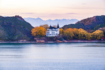An old beautiful house built in the Gothic style on the shore of Lake Kapchagay not far from Almaty.