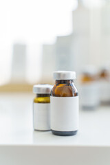 Glass medical bottle with medicine. Medicine concept, vaccination, space for text, close-up