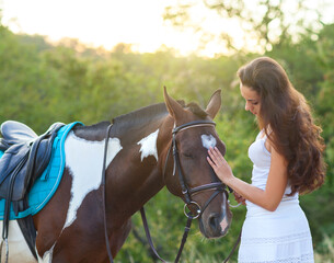 Fototapeta premium Beautiful woman and a horse