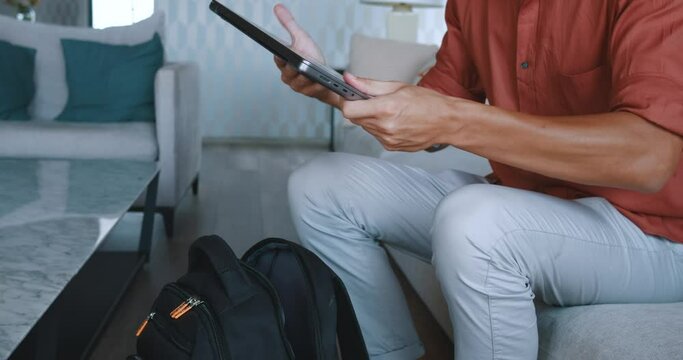 man closes his laptop, puts it backpack, leaves. Mobility enables flexibility. Mobility action. Mobility defines modern work, illustrating ease movement dynamic lifestyles. digital world.