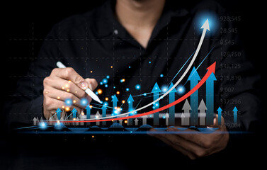 Businessman analyzing growth sales data graph on modern interface icons. digital online marketing Financial and investment business planning and development..