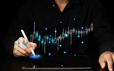 Increase investments concept. Businessman plan (predict) investments growth represented by graph..