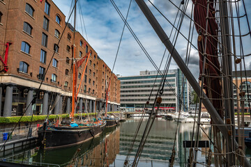 Boats And Ships In St Katharine Docks With Office Buildings And Restaurants In London, United...