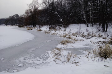 winter pond landscape with snow