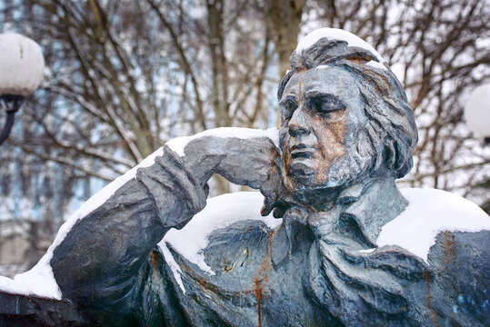 Minsk, Belarus. Jan 21, 2022. Adam Mickiewicz monument in covered in snow in winter city park. Adam Mickiewicz memorial in Minsk region situated in Ramanauskaja Slabada str.