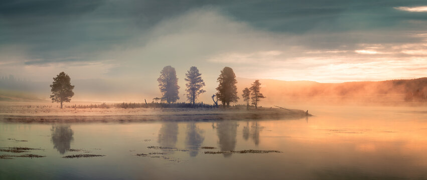 Sunrise on a moody and foggy morning at Lake Yellowstone in the Yellowstone National Park, Wyoming