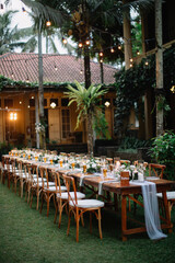 Outdoor Decoration for wedding event or avenue. Family dinner. Gathering. Engagement. Private party. Pool side. Drop lights. Floating candles. Table Setting. Center piece flowers. 