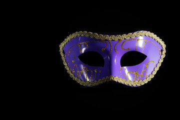 Carnival mask, a Venetian accessory, perfect for a festive opera night, black background