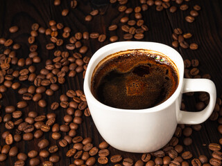 cup of coffee with beans