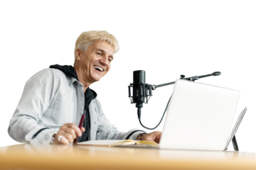 A male presenter is recording a podcast in a recording studio using a microphone and laptop equipment. Transparent background.