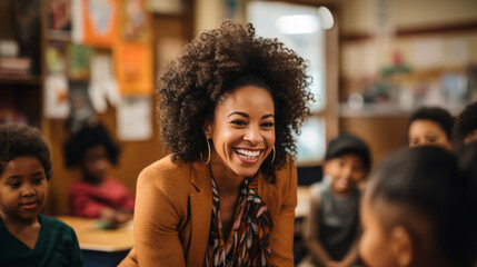 African American teacher inspiring students in her classroom