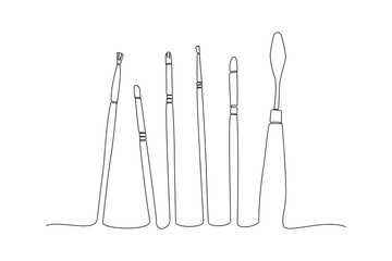Continuous one line drawing painting tools. Stationery Concept. Single line draw design vector graphic illustration.