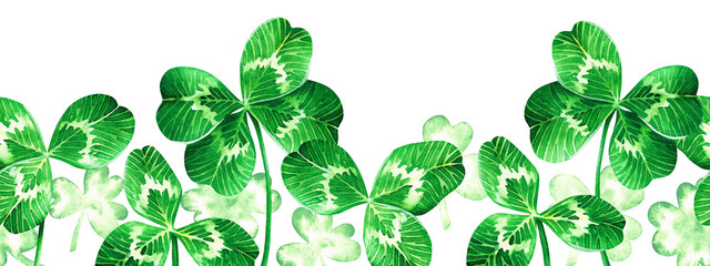 Clover seamless Border. Watercolor illustration for St. Patrick's Day. Hand drawn on isolated background. Drawing of Shamrock pattern. Painting of four leaf plant for greeting card and invitation
