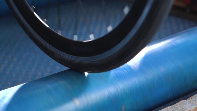 A Professional Cycling Team Trains Indoors on Roller Trainer