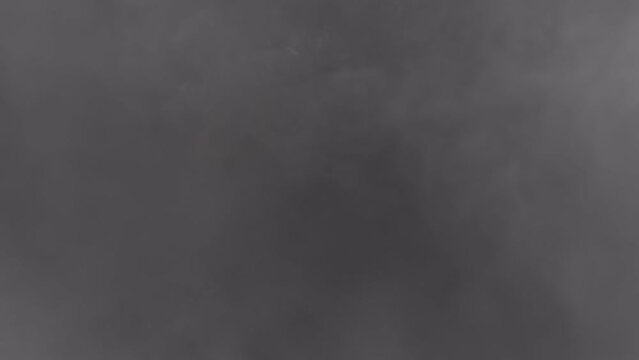 From an aerial standpoint, the aftermath of a volcanic eruption unfolds in chaotic yet captivating fashion. This compelling footage offers a sweeping visual experience. VFX with alpha channel.