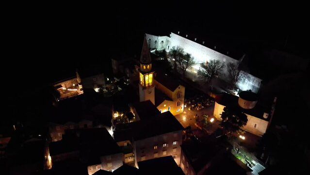 Drone flying over the Church of St. Nicholas in the Old Town of Budva