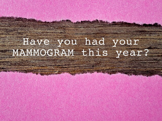 Women health care concept - have you had your mammogram this year text with pink background. Stock photo.