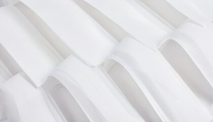 strips of white paper with folds close up