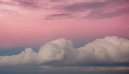 some clouds are over a pink sky