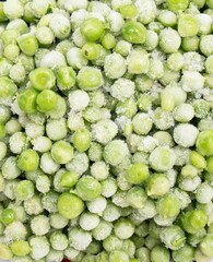 close up of frozen green peas