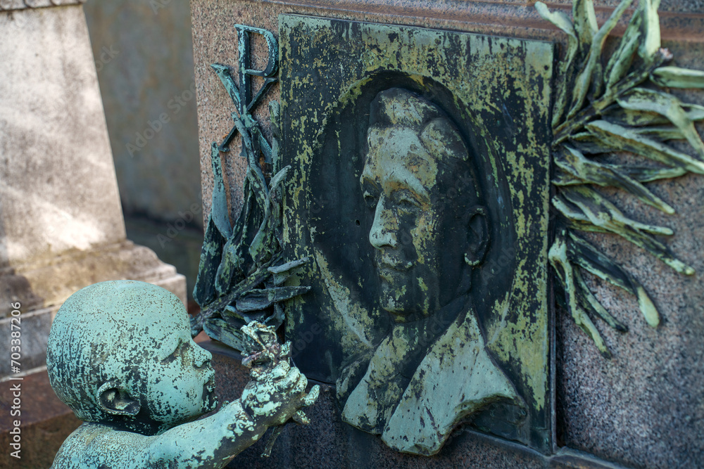 Wall mural Cimitero Monumentale, historic cemetery in Milan, Italy. A tomb