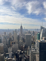 Fototapeta na wymiar Aerial panoramic view of New-York city Manhattan skyline Empire State Building and One world trade center skyscraper, from top of the rock
