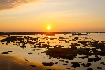 Fototapeta na wymiar A Mesmerizing Sunrise Landscape. Captivating Sunrise Vista from St. Martin's Serene Shoreline. Saint Martin Island, Bangladesh