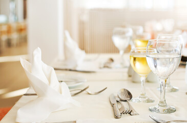 Glasses and plates on the tables