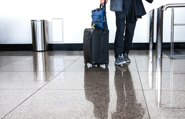 Tourist with luggage at airport