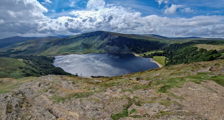 Scenic Lough Tay, colloquially known as the Guinness Lake, nestled amidst the verdant Wicklow Mountains.