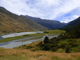 Rob Roy track, Wanaka, Mt, Aspiring national park in South Island of New Zealand. Rob Roy glacier in the background,, with glacial river in the valley.