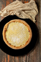 white chocolate pizza with coconut shavings. Brazilian pizza