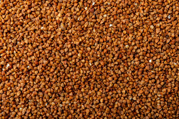 Buckwheat. Buckwheat grain isolated on white background. Healthy food. Porridge. Diet. Organic cereal.
 Cereals background. Banner.