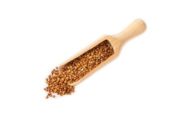 Buckwheat in wooden spoons. Buckwheat grain isolated on white background. Healthy food. Porridge. Diet. Organic cereal